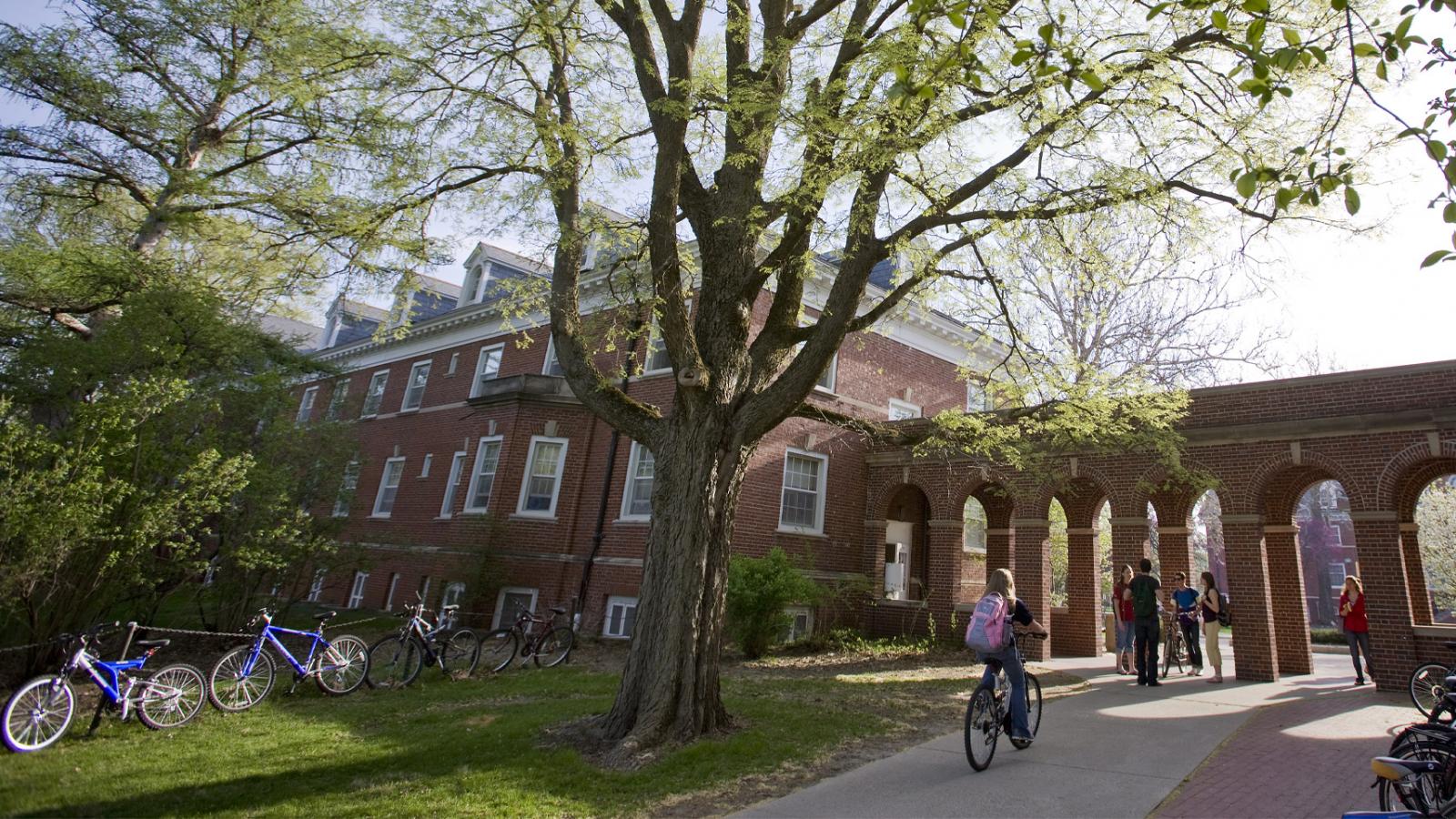 students in front of building