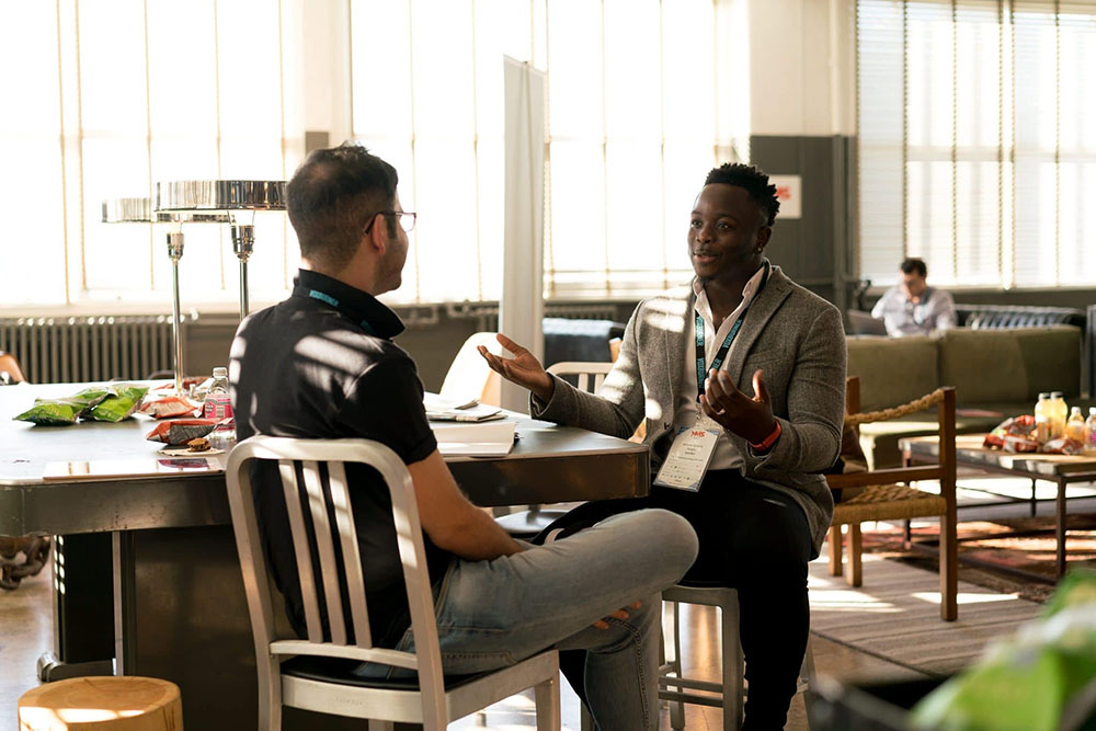 photo-of-men-having-conversation
