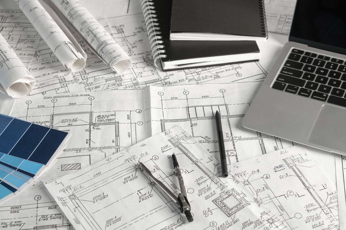 Architects concept, engineer architect designer freelance work on start-up project drawing, construction plan.