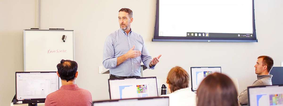 teacher speaking to students